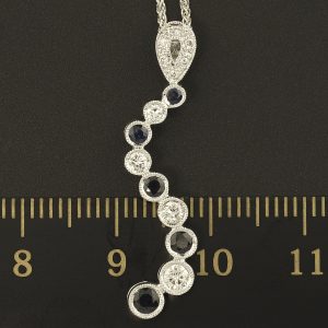 18ct White Gold Diamond & Sapphire Wave Pendant & 18ct Chain